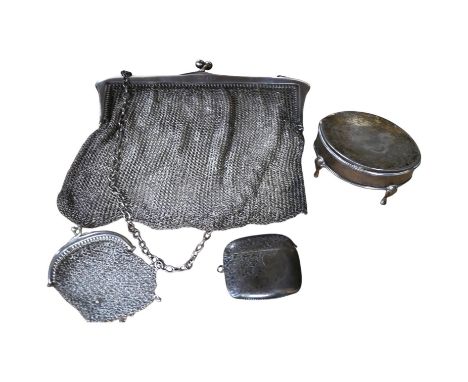 A George V silver trinket box, 68mm, a silver vesta case and two silver mesh evening bags. Condition - poor to fair
