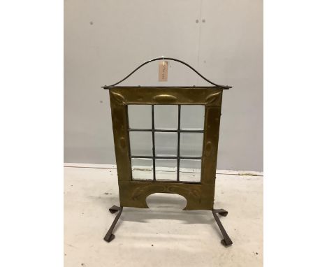 An Arts &amp; Crafts glazed brass and wrought iron firescreen, width 60cm, height 77cm. Condition - fair to good