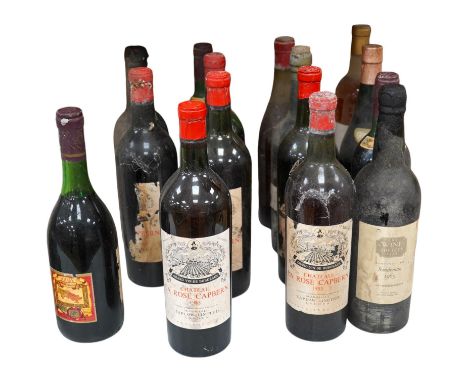 Fifteen bottles of wine and fortified wine, including; a Sandeman 1963 port, four bottles of Chateau La Rose Capbern 1953, a 