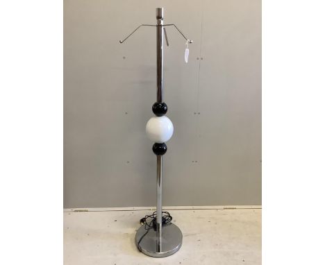 A Contemporary chrome and glass floor lamp, lacking shade, height 160cm. Condition - good