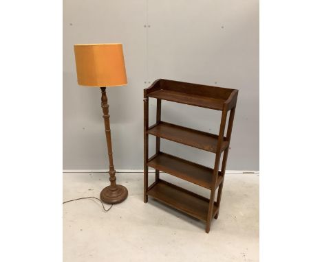 A 1930's oak lamp standard and an open bookcase, width 56cm, depth 20cm, height 98cm. Condition - good