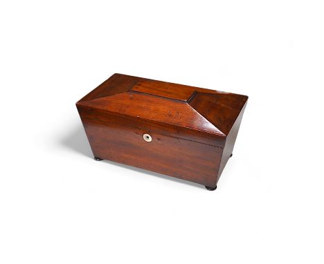 A Victorian mahogany sarcophagus shaped tea caddy with mother of pearl inlaid escutcheon, 28cm. Condition - fair