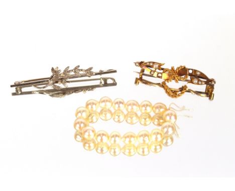 A 9ct white gold bar brooch, with leaf and pearl decoration, approx. 3gms; a 15ct gold pearl set bar brooch; a small string o