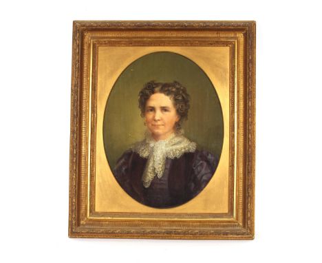 19th Century school, portrait study of a lady wearing dark blue dress with lace trim, framed as an oval 42cm x 32cm, unsigned