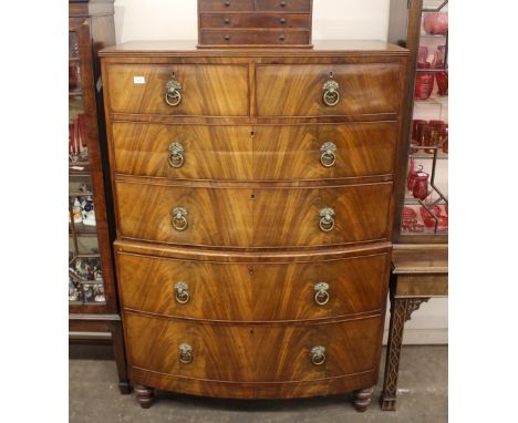 A 19th Century mahogany bow front tallboy,&nbsp;fitted two short and two long drawers to the upper section, two long drawers 