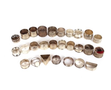 A collection of various silver napkin rings,&nbsp;including a pair of filigree work examples by Edward Hutton, London 1889 et