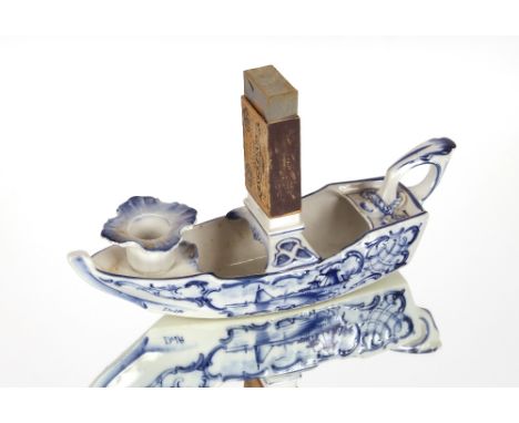 An unusual Delftware barge shaped chamberstick / matchbox holder, 22cm long