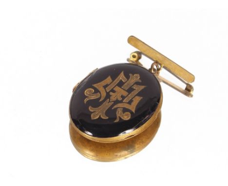 A late Victorian black enamel and yellow metal locket brooch,&nbsp;with monogrammed decoration