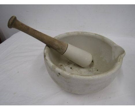 A heavy ceramic poss stone pestle and mortar 10" diameter