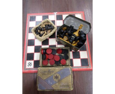 Ebony chess set, chess board, draughts and another chess set- all complete