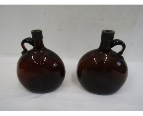 2 vintage handblown brown bottles- with deep indents to bottom and the numbers 9 and 10 etched