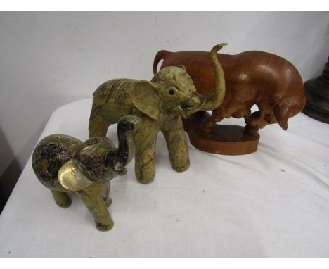 Treen taurus bull, brass elephant and light wooden elephant