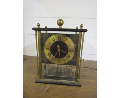 Electronic mantel clock with visible electronic workings