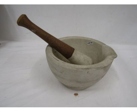 A heavy ceramic poss stone pestle and mortar 8"dia