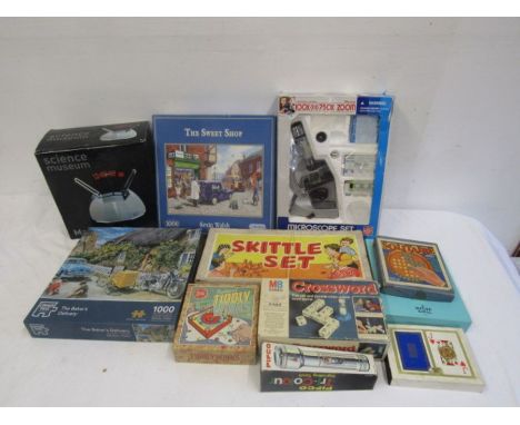 Vintage games, jigsaw puzzles, Science Museum lamp and microscope 