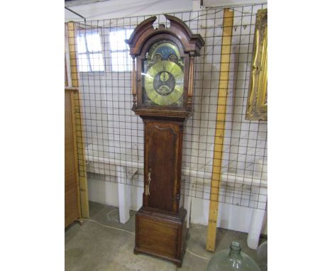 A  long cased clock with brass chapter ring striking with date, seconds and day/night bearing the name Dolly Rollyson Hilton 