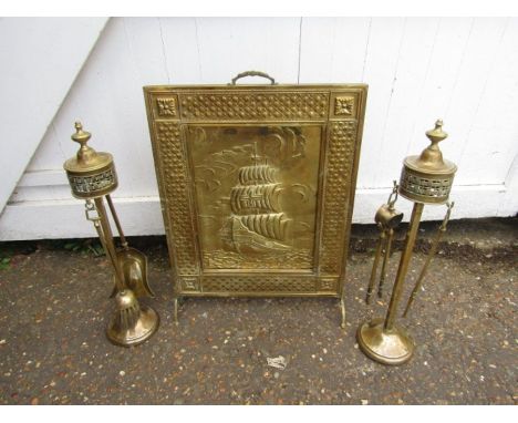 A pair brass companion sets and a brass fire screen 