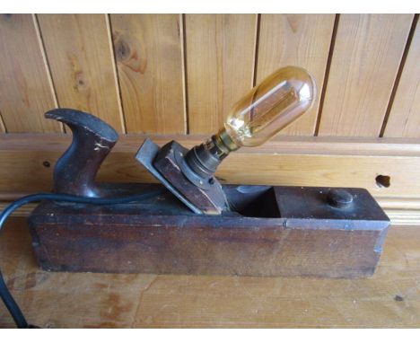 A carpenter's plane lamp