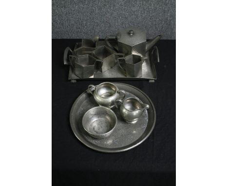 A vintage Art Deco hammered pewter tea set of hexagonal form, together with another circular  part tea set. H.36 W.22cm. (lar