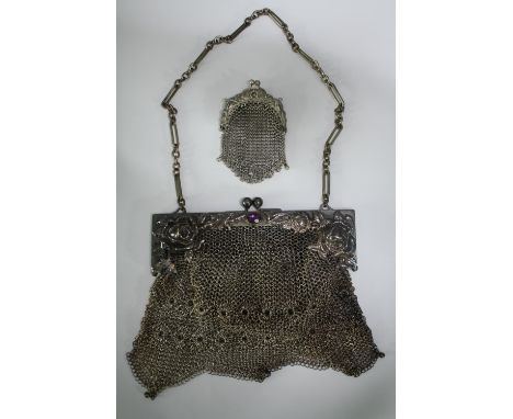 A German Art Nouveau white metal chainmail bag with inset cobochon, stamped 'German Silver', and a matching purse. H.17 W.18c