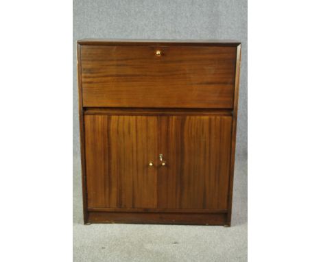 A mid 20th century teak drinks cabinet. H.113 W.91 D.28cm. 