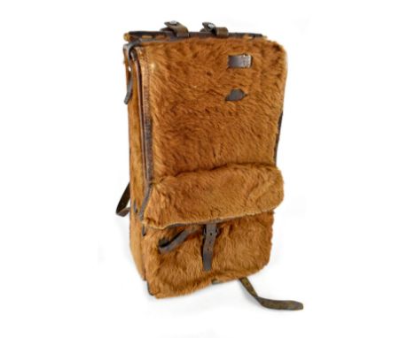 A Swiss WWII army Tornister backpack, an all-over covering of long goat fur concealing various compartments, marked to the in