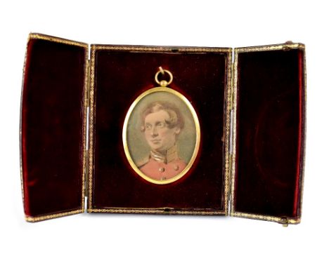 A 19th century portrait miniature of an army officer in red tunic, painted on paper and mounted in a gold plated and glazed f