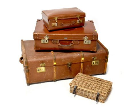 A large vintage 'Vulcan Fibre' brown leather suitcase, length 66cm, a smaller brown leather case, length 40cm, each with stit