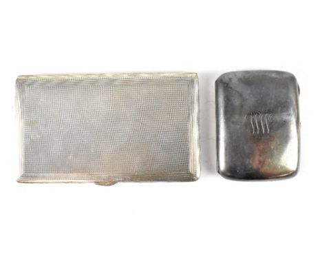 A George V hallmarked silver cigarette case by Brook &amp; Son, 1935, with 'WW' initials to the front and a George VI hallmar