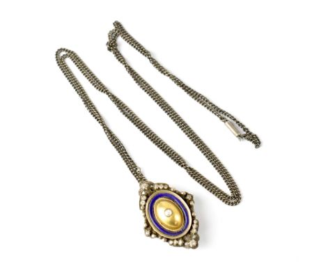 A 19th century mourning brooch, a central inset pearl on gilt dome within a border of blue enamel in lozenge-shaped mount set
