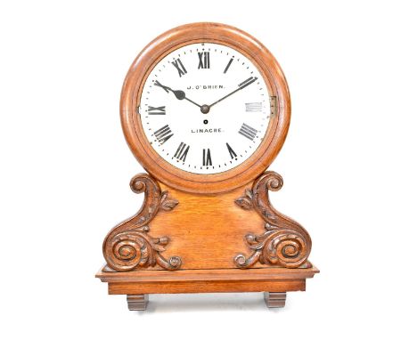 J O'Brien, Linacre; an oak-cased church wall clock of large proportions, from the Linacre Mission (Booth) Liverpool, the pain