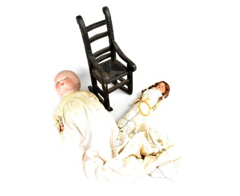 An Armand Marseille German 'Dream Baby' bisque head doll with sleepy eyes and closed mouth, mould no. 341/8.K with composite 