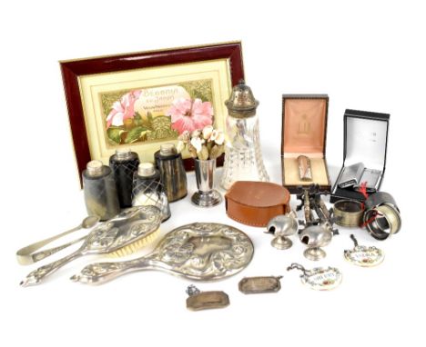 A cut glass sugar sifter with hallmarked silver top, marks rubbed, a set of four plated knife rests, two white metal salts in