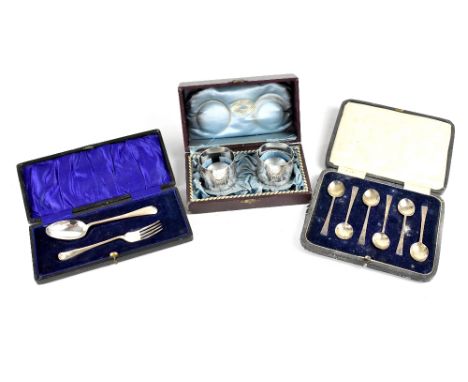 A cased set of two Swedish silver napkin rings with Swedish three crowns coat of arms in a trefoil shaped mark, cartouche eng