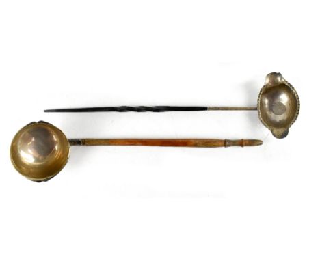 A George IV coin inset silver toddy ladle with twisted baleen handle, together with a late Victorian silver ladle with deep b