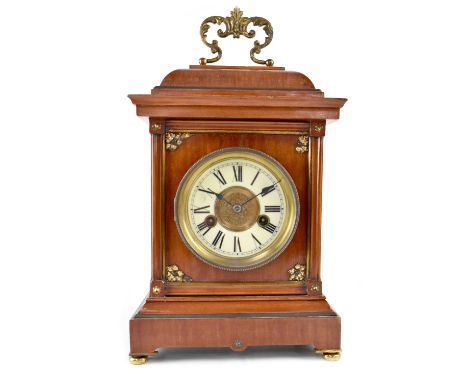 H A C; an early 20th century German fourteen-day strike mantel clock, the enamelled and gilded dial set with black Roman nume