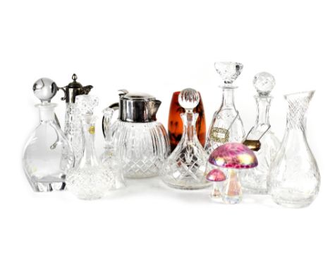 Various items of clear and coloured glass to include cut glass crystal decanters of various shape and form, to include two de