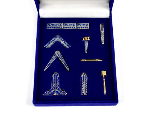 Modern Masonic 'Working Tools' lapel set with blue enamel on gold plate, in presentation box.