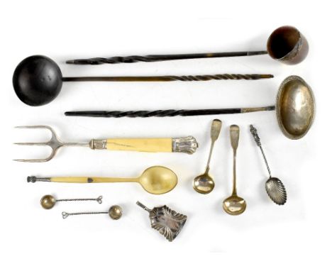 An early 19th century silver toddy ladle on twisted baleen handle, two further toddy ladles, each with possible hollowed bowl