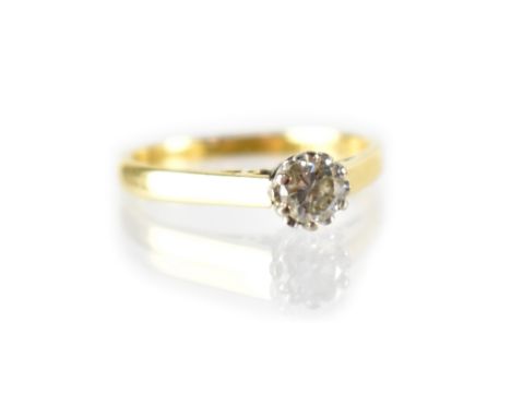 An 18ct gold diamond solitaire ring, the claw-set diamond weighing approx 0.25ct, size M, approx 2.7g.