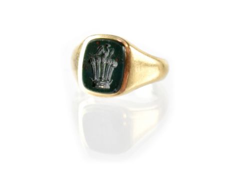 A gentlemen's hallmarked 9ct gold signet ring with heraldic crest intaglio depicting a crown with feather plume with emerging