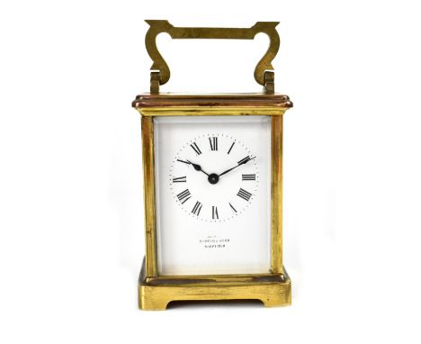 Mappin &amp; Webb; a brass-cased carriage clock, the enamelled dial set with Roman numerals, signed, French movement in plain