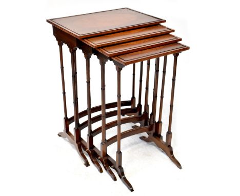 A Regency-style mahogany quartetto, the four rectangular tops with inset bird's-eye maple panels and walnut surround, on ring