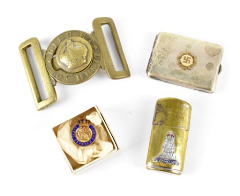 A collection of military items to include British army belt buckle, a WWII May Victory lighter bearing the Royal Pioneer Corp