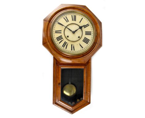 A Victorian American mahogany cased drop-down octagonal eight-day wall clock, the white dial set with black Roman numerals, l