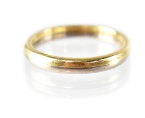 An 18ct bi-colour band ring, yellow and white gold, size W, approx 7.1g.