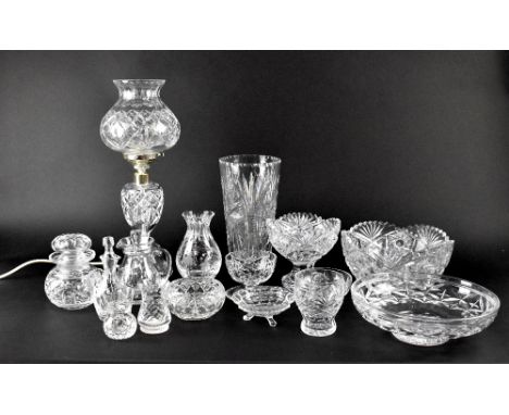 A large quantity of cut glass crystal, pressed glass and engraved glass items to include fruit bowls, vases, vinegar flagons,