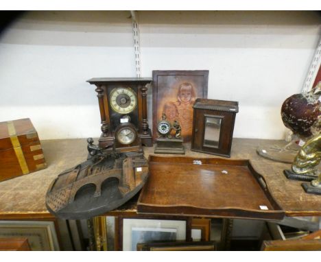 A 19th Century beech mantel clock, a Japanese carved wooden plaque, a mahogany serving tray and an embossed leather picture o