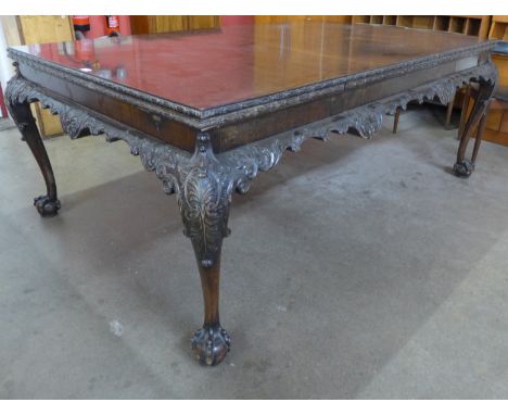 A large Chippendale Revival carved mahogany extending dining table 