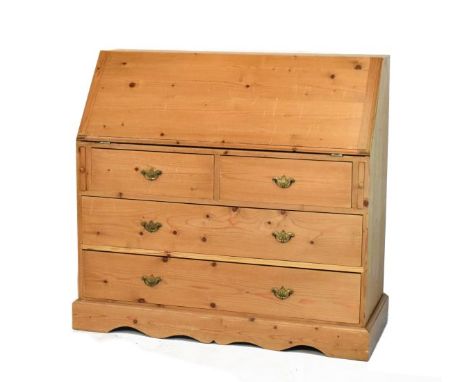 Reproduction Victorian style natural pine bureau, the fall flap opening to reveal a fitted interior, two short and two long d